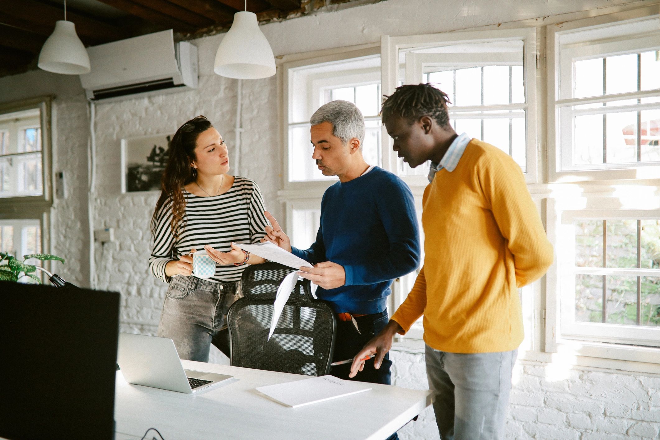 Consultants collaborating on digital platform strategy