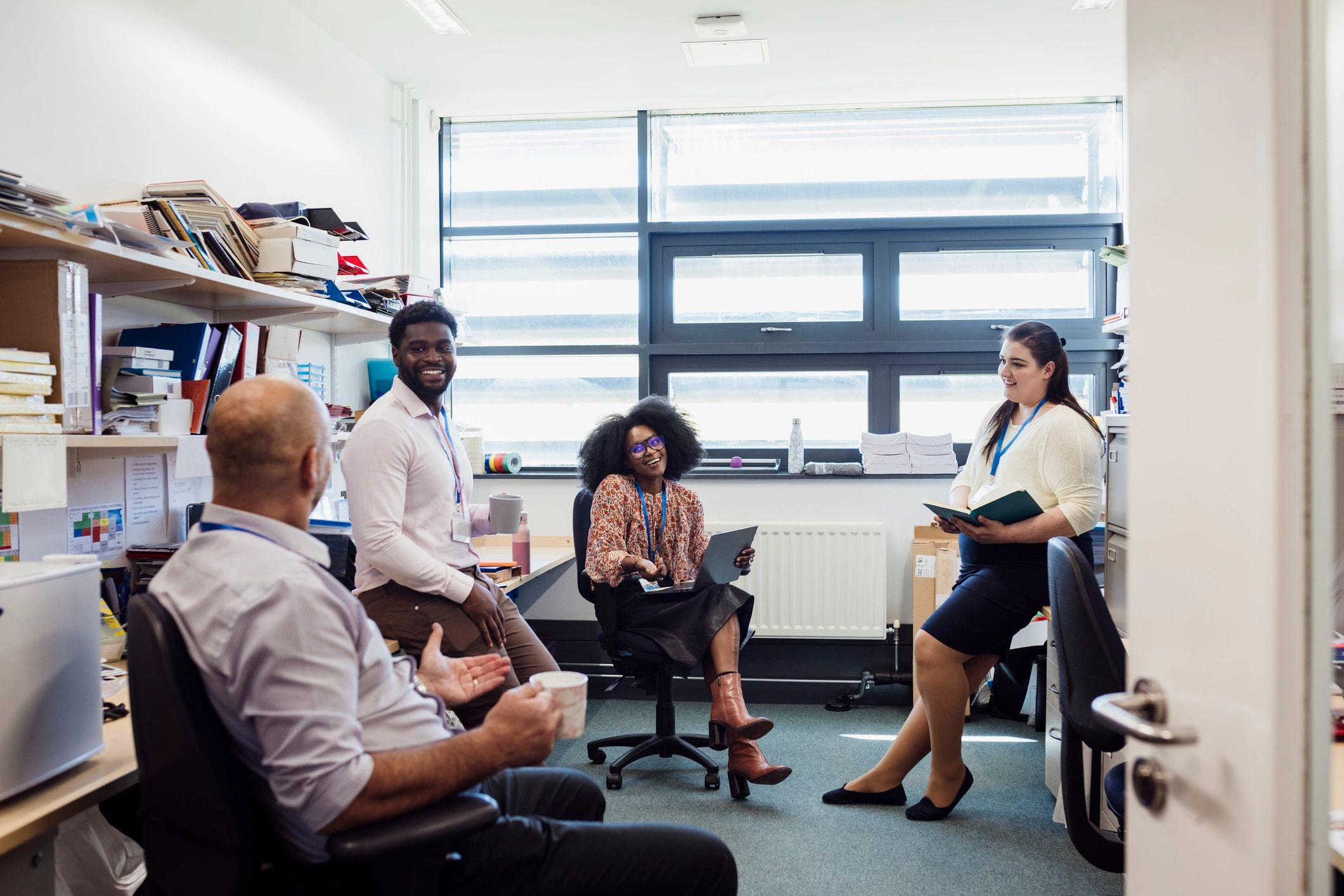 Professional team taking a collaborative break in the office
